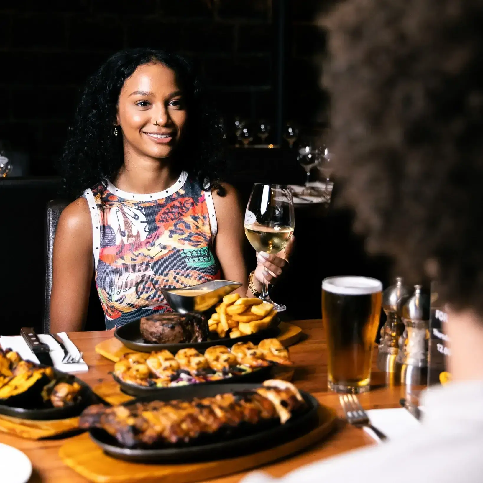 Women Enjoying Steak Food