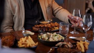 Man Enjoying Steak Food